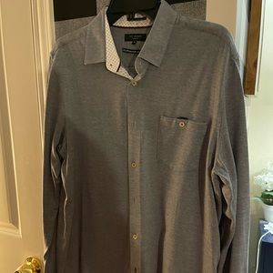 Long sleeve light blue button down dress/casual shirt. Ted Baler brand.